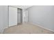 Bedroom featuring plush carpet, closet, and a doorway at 100 Grandview Dr, Henderson, NV 89002