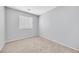 Neutral bedroom with carpet flooring and a bright window allowing natural light at 100 Grandview Dr, Henderson, NV 89002