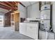 Garage interior includes a washer, dryer, and water heater at 100 Grandview Dr, Henderson, NV 89002