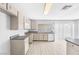 Spacious kitchen with modern appliances and a large sliding glass door at 100 Grandview Dr, Henderson, NV 89002