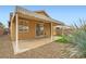 View of a covered patio and low-maintenance backyard, blending outdoor living with desert aesthetics at 10011 W Cherokee Ave, Las Vegas, NV 89147