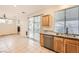 Modern kitchen featuring stainless steel appliances, granite countertops, and a sink at 10011 W Cherokee Ave, Las Vegas, NV 89147