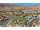 Aerial view of community and neighborhood pool, showcasing the home's location and amenities at 10466 Smokewood Rd, Las Vegas, NV 89135