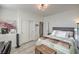 Bedroom featuring a bed, desk, closet and decor at 10466 Smokewood Rd, Las Vegas, NV 89135