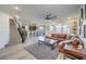 Bright and airy living room features hardwood floors, stylish decor, and an inviting atmosphere at 10466 Smokewood Rd, Las Vegas, NV 89135