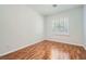 Cozy bedroom with plantation shutters allowing the sun to filter in at 11125 Twilight Times Ct, Las Vegas, NV 89135