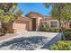 Lovely single-Gathering home featuring a two-car garage and well-maintained landscaping at 11125 Twilight Times Ct, Las Vegas, NV 89135
