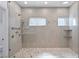 Spacious shower with tiled walls, dual shower heads and sleek glass enclosure at 11775 Woodbrook Ct, Las Vegas, NV 89141