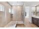 Modern shower with glass enclosure, tile flooring, and contemporary fixtures at 11775 Woodbrook Ct, Las Vegas, NV 89141
