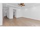 Spacious bedroom showcasing wood floors and neutral wall color at 11775 Woodbrook Ct, Las Vegas, NV 89141