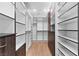 Custom closet with ample shelving, hanging rods, and integrated drawers at 11775 Woodbrook Ct, Las Vegas, NV 89141