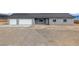 Charming single-story home featuring a two-car garage and a well-maintained gravel front yard at 1330 W Gee St, Pahrump, NV 89060