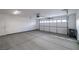 Spacious and clean two-car garage with an automatic door opener, interior door, and concrete flooring at 1330 W Gee St, Pahrump, NV 89060
