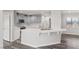 An inviting kitchen showcasing bright countertops, modern appliances and new flooring at 1330 W Gee St, Pahrump, NV 89060