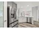 Modern kitchen featuring stainless steel appliances, quartz counters, and bright light at 1330 W Gee St, Pahrump, NV 89060