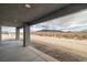 Covered patio with scenic views of the desert landscape; ideal for outdoor relaxation at 1330 W Gee St, Pahrump, NV 89060
