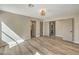 Spacious bedroom featuring wood-look floors and multiple closets for ample storage at 1665 Rowan Tree Dr, Las Vegas, NV 89123