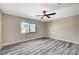 Bedroom featuring ceiling fan, large window, and ample space for furniture at 1904 Roxbury Ln, Las Vegas, NV 89119