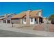 Inviting single-story home with a well-manicured yard, brick accents, and a convenient two-car garage at 1904 Roxbury Ln, Las Vegas, NV 89119