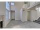 Bright living room features vaulted ceilings, fireplace, and tile flooring at 1989 Bookbinder Dr, Las Vegas, NV 89108