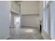 Bright living room features vaulted ceilings, fireplace, and tile flooring at 1989 Bookbinder Dr, Las Vegas, NV 89108