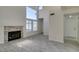 Bright living room features vaulted ceilings, fireplace, and large windows at 1989 Bookbinder Dr, Las Vegas, NV 89108