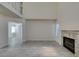 Bright living room features vaulted ceilings, fireplace, and tile flooring at 1989 Bookbinder Dr, Las Vegas, NV 89108