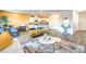 Bright open-concept living room with modern furniture at 200 Biscotti Ave # Lot 122, North Las Vegas, NV 89084