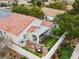 Aerial view of backyard, outdoor kitchen, garden archway, patio, and desert landscaping at 2008 Hobbyhorse Ave, Henderson, NV 89012