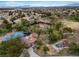 Community aerial view showcasing a park with tennis courts, play areas and lush greenery at 2008 Hobbyhorse Ave, Henderson, NV 89012
