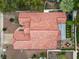 An aerial view of a single-story home with a red tile roof, surrounded by mature trees and landscaping at 2008 Hobbyhorse Ave, Henderson, NV 89012