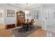 Formal dining room featuring hardwood floors, traditional decor, and elegant lighting at 2008 Hobbyhorse Ave, Henderson, NV 89012