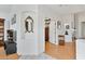 Bright, spacious hallway featuring hardwood floors and showcasing the home's open layout at 2008 Hobbyhorse Ave, Henderson, NV 89012