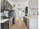 Modern kitchen with stainless steel appliances, sleek countertops, and tile flooring at 2008 Hobbyhorse Ave, Henderson, NV 89012