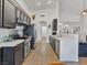 Bright kitchen with stainless steel appliances, sleek countertops, and tile flooring at 2008 Hobbyhorse Ave, Henderson, NV 89012