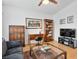 Well-lit living room featuring hardwood floors, comfortable seating, and stylish furniture arrangements at 2008 Hobbyhorse Ave, Henderson, NV 89012