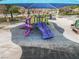 A colorful, covered playground features slides, climbing structures, and seating areas at 2008 Hobbyhorse Ave, Henderson, NV 89012