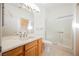 Bathroom featuring a single sink vanity and a shower and tub combo at 2147 Indigo Creek Ave, Henderson, NV 89012