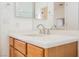 Bathroom with a single sink vanity and a large mirror at 2147 Indigo Creek Ave, Henderson, NV 89012