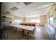 Inviting classroom with large windows, tables and chairs, perfect for learning and collaboration at 2147 Indigo Creek Ave, Henderson, NV 89012