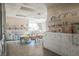 Sunlit craft room is fully stocked, offering a bright and inspiring space for creative hobbies at 2147 Indigo Creek Ave, Henderson, NV 89012