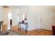 Light and airy entryway features a decorative table, leading to other rooms in the house at 2147 Indigo Creek Ave, Henderson, NV 89012