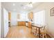 Bright eat-in kitchen features white appliances and light wood cabinetry at 2147 Indigo Creek Ave, Henderson, NV 89012
