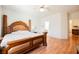 Large main bedroom featuring wood floors and a traditional style bed at 2147 Indigo Creek Ave, Henderson, NV 89012