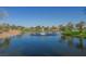 Picturesque community pond with fountain surrounded by green landscapes at 2147 Indigo Creek Ave, Henderson, NV 89012