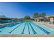 Enjoy this community pool with lane lines and covered seating surrounded by scenic views at 2147 Indigo Creek Ave, Henderson, NV 89012