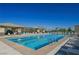 Enjoy a refreshing swim in this large community pool with shaded cabanas and lounge chairs at 2147 Indigo Creek Ave, Henderson, NV 89012