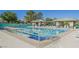 Enjoy this community pool with covered seating, perfect for relaxation and leisure in the neighborhood at 2147 Indigo Creek Ave, Henderson, NV 89012