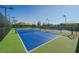 Well-maintained tennis courts provide recreational opportunities, and active outdoor enjoyment at 2147 Indigo Creek Ave, Henderson, NV 89012
