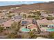 Aerial view of home featuring solar panels and private backyard pool at 2151 Bannerwood St, Henderson, NV 89044